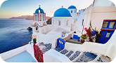Santorini village with blue doors and sea view