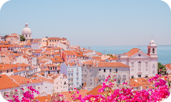 Colorful tiled buildings and yellow tram in Lisbon, Portugal